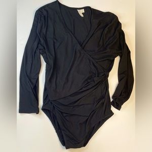 Black bodysuit, crossover bust. Cute alone or under something.